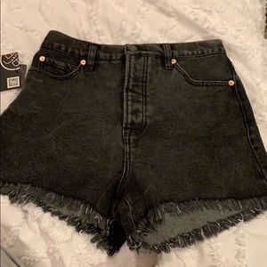 never worn tags still on black denim shorts